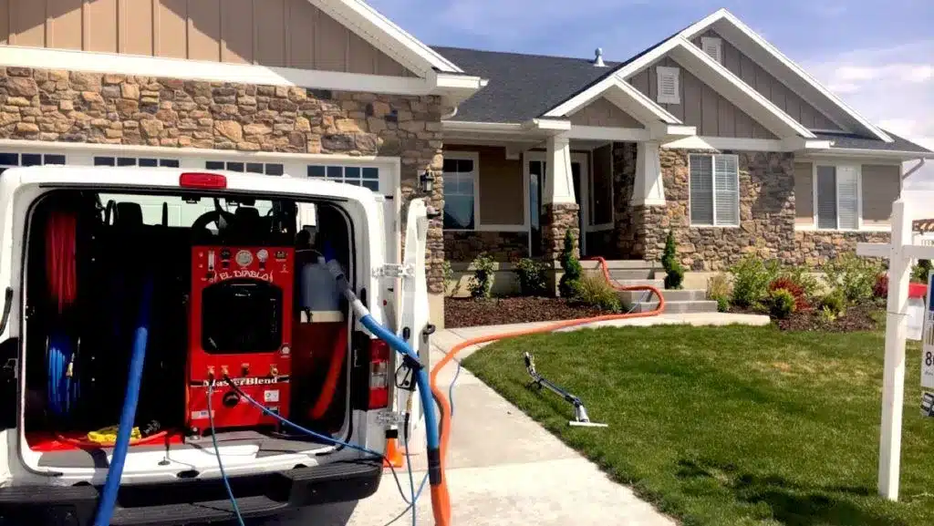 A truck with a vacuum attached to it providing carpet cleaning services in Salt Lake City.