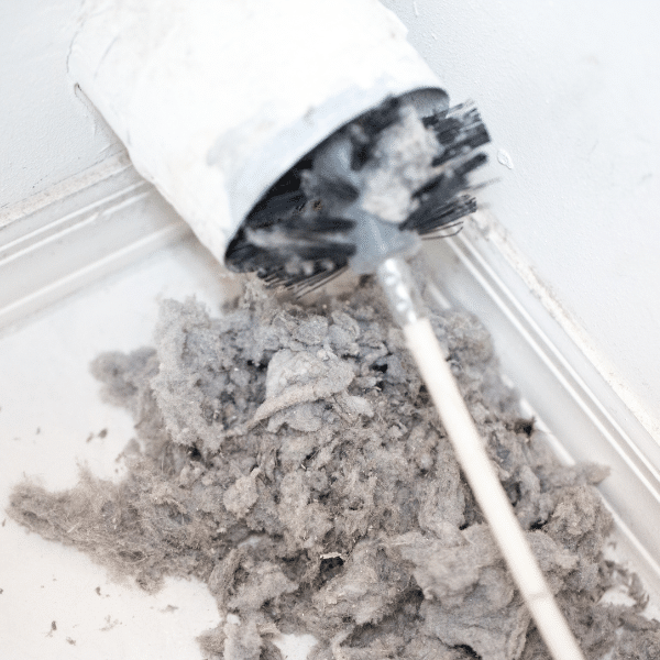 Lint blocking a dryer vent posing fire hazard