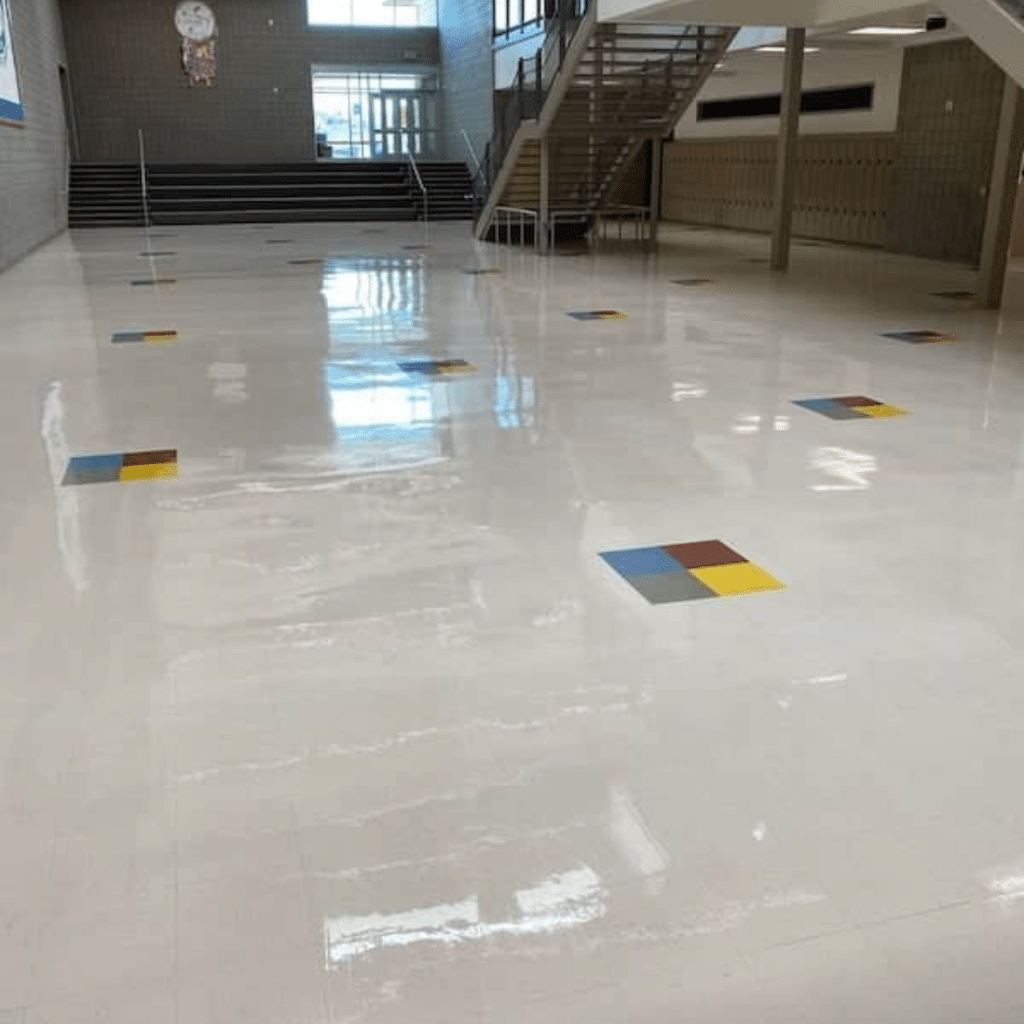 VCT Flooring Maintenance: How Often Should You Strip and Wax? - Father and Son Carpet Cleaning Before and after VCT floor waxing comparison showing restored shine.