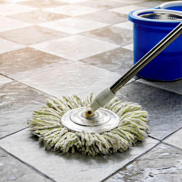 How Often Should You Clean Your Tile and Grout? - Father and Son Carpet Cleaning Clean tile floor in a modern kitchen after routine maintenance